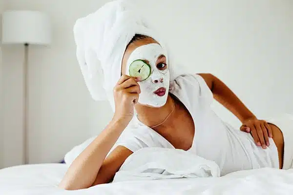 Teenage Girl Making Facial Mask