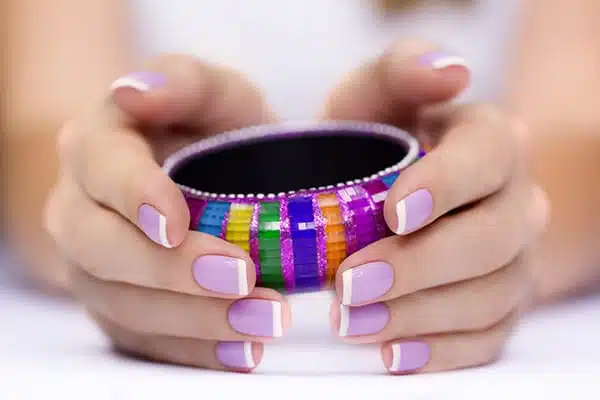 Bright Multi-Colored Bracelet In Woman's Hands